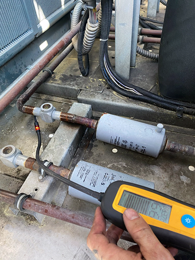 Meter testing an HVAC line